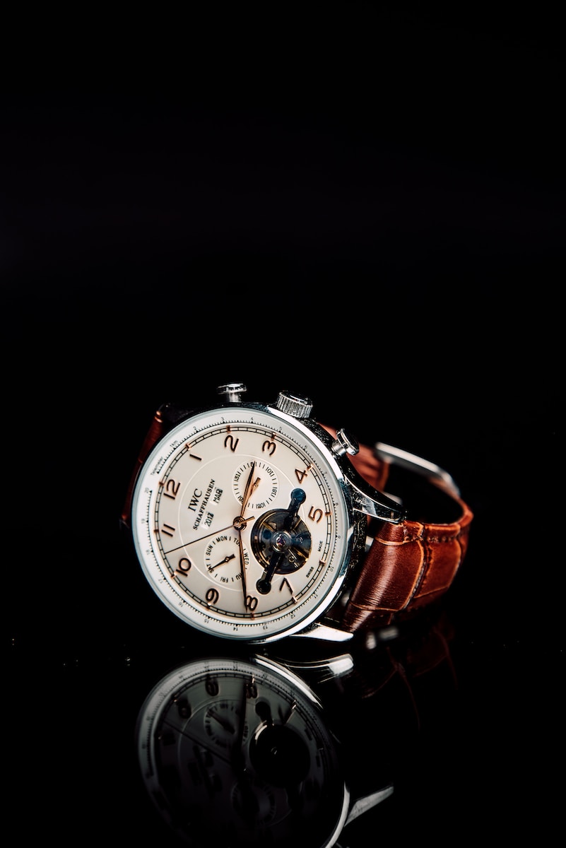 luxury watch round silver-colored chronograph watch with brown leather strap
